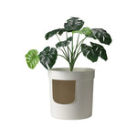 MODERNA Hidden Planter est une caisse à chat fermée ressemblant à un vrai pot de fleur.