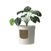 MODERNA Hidden Planter est une caisse à chat fermée ressemblant à un vrai pot de fleur.